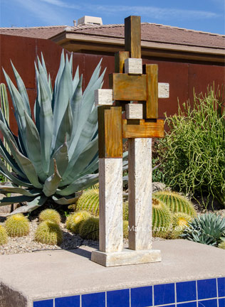 Travertine and steel sculpture